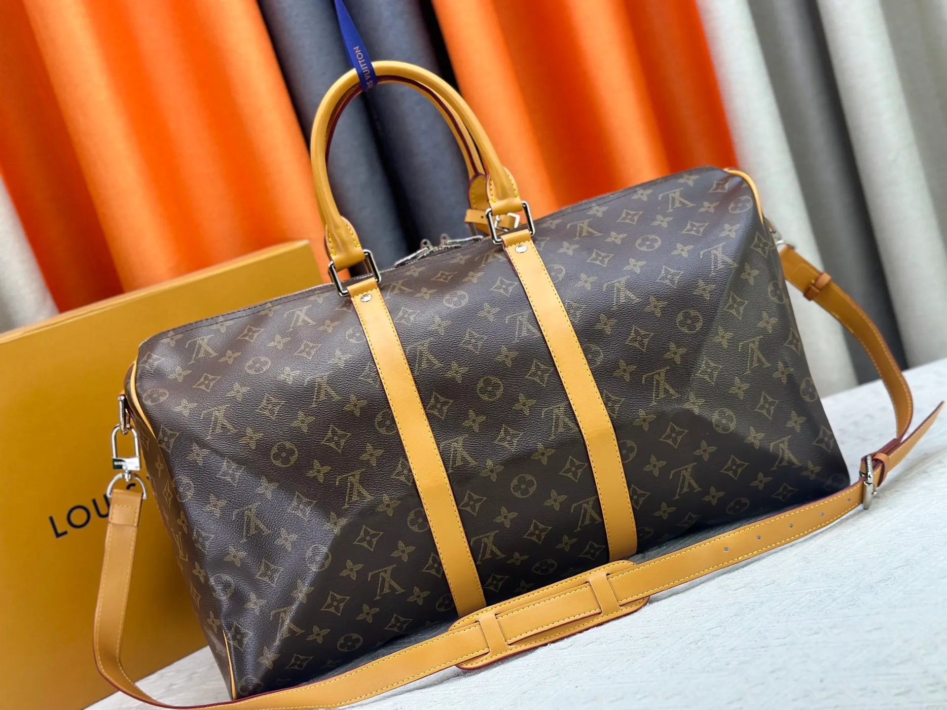 P360 Upgraded Original M41416 M12634 Yellow M12633 Dark Blue M12629 Light Blue M12630 Dark Green Top Original This Keepall Bandoulière 50 travel bag is made of Monogram Macassar canvas, which simultaneously renders bright colors for the side straps, nameplate, fabric lining and top leather handle. The size of your carry-on luggage hides plenty of space. 50.0 x 29.0 x 23.0 cm (L x H x W) • Monogram Macassar coated canvas • Cow leather trim • Textile lining • Metal hardware • Carry-on dimensions • Double zipper closure • Padlock • Removable name tag • Internal zip pocket • Shoulder strap: removable, adjustable • Half-length strap: 36.0 cm • Half-length strap adjustable to: 50.0 cm • Handle: Double handle