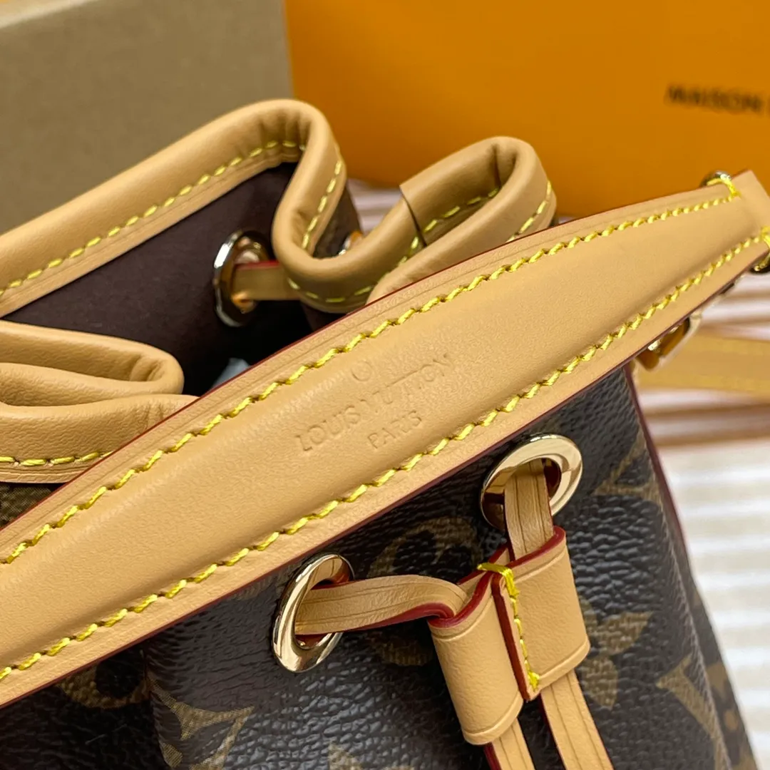 [Upgraded version] P560🐶Upgraded version*High quality❣️With full packaging M81266🐶NANO NOÉ handbag This Nano Noé handbag condenses the classic configuration of the 1932 Noé handbag, using Monogram canvas and cowhide leather trim to combine traditional design and contemporary functionality. Plenty of space to hold keys, card holders, mobile phones and other travel essentials, and the detachable handle and detachable and adjustable shoulder strap allow for a variety of carrying methods. Dimensions: 13 x 16 x 10 cm