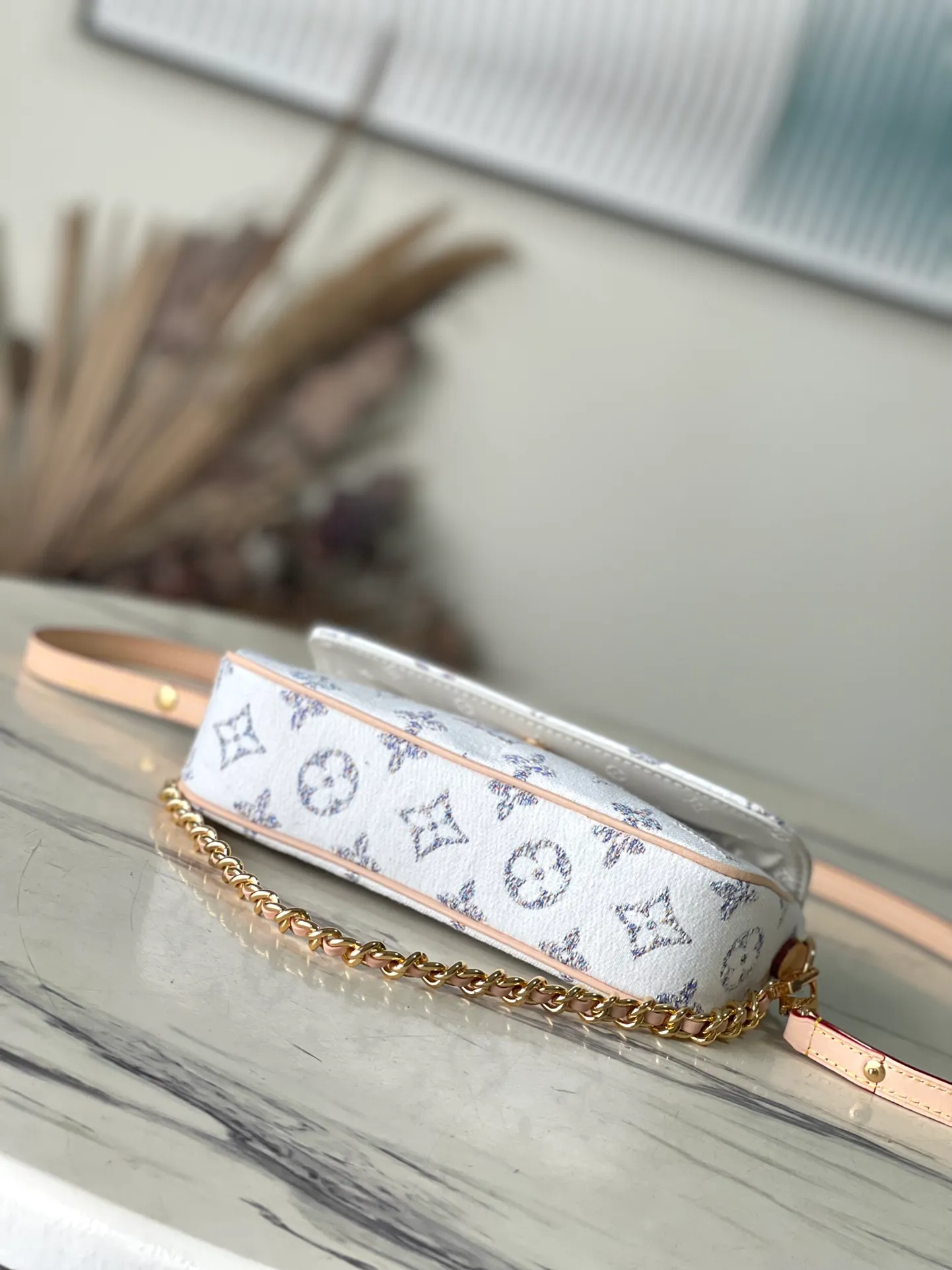 💰900 Top Original Order M83499 This Wallet on Chain Ivy handbag opens with a magnetic flap and has a rounded rectangular body, presenting a modern interpretation of a mini handbag. Monogram jacquard fabric traces the texture of tweed and is offset by leather trim. The adjustable leather shoulder strap and lace-up chain are both removable, allowing for a variety of styling possibilities. Dimensions: 23.5 x 12 x 4.3 cm (length x height x width)