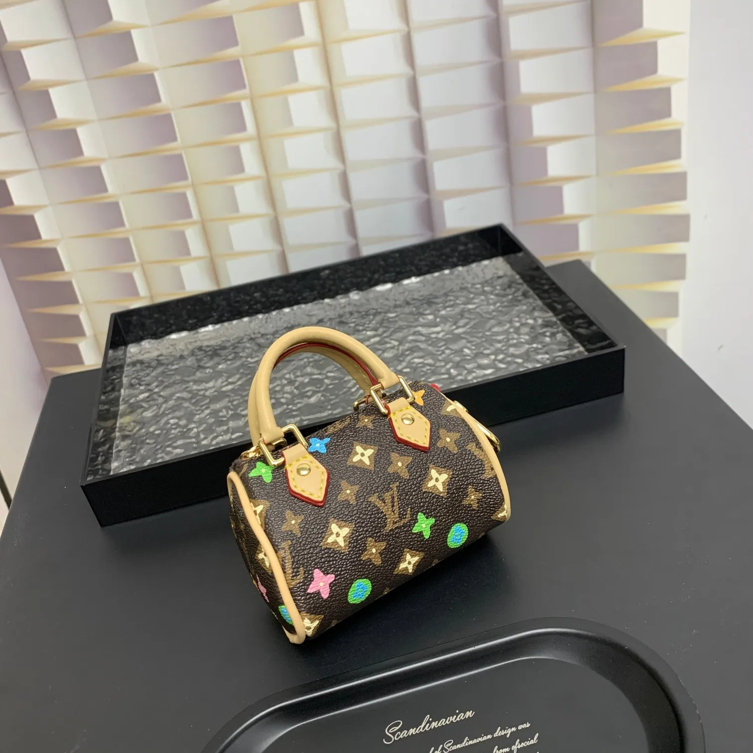 💰200 shipped😍 MINI KEEPALL bag charm and keychain ☀️Louis Vuitton Louis Vuitton lv mini pillow bag pendant ☀️This Mini Keepall bag charm and keychain condenses the classic handbag configuration, boldly showing the spirit of adventure. Monogram canvas with LV inscribed hook buckle, whether hung on a belt or handbag, its zipper closure and built-in keychain ensure secure storage