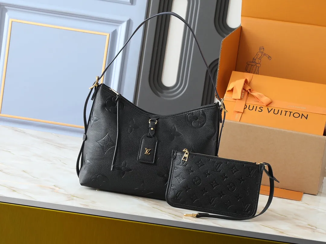 💰240💰Upgraded from the original M24141 M46288 M46293 M46277 M46298 M46203 CarryAll small handbag is made of Mono gram Empreinte embossed leather. It has a generous structure and a neat inner layer. The large inner bag adds functional elements. Comes with a Monogram embossed zipper clutch secured by a leather strap. A personal companion for urban life. Dimensions 29 x 24 x 12 cm (length x height x width)