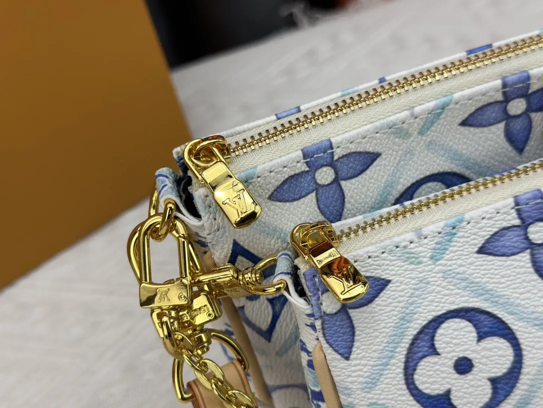 P260 Upgraded version M44823 M25374 Blue Five-in-one Mahjong bag series The new season MULTI POCHETTE ACCESSOIRES Xph handbag This Multi Pochette Accessoires handbag comes from the LV By The Pool series, using Monogram Tiles canvas to release the summer atmosphere, and then the zipper bags are nestled together. Explore more styling and carrying possibilities with the detachable and adjustable wide fabric shoulder strap and dazzling chain. Dimensions: 24 x 13.5x4 cm