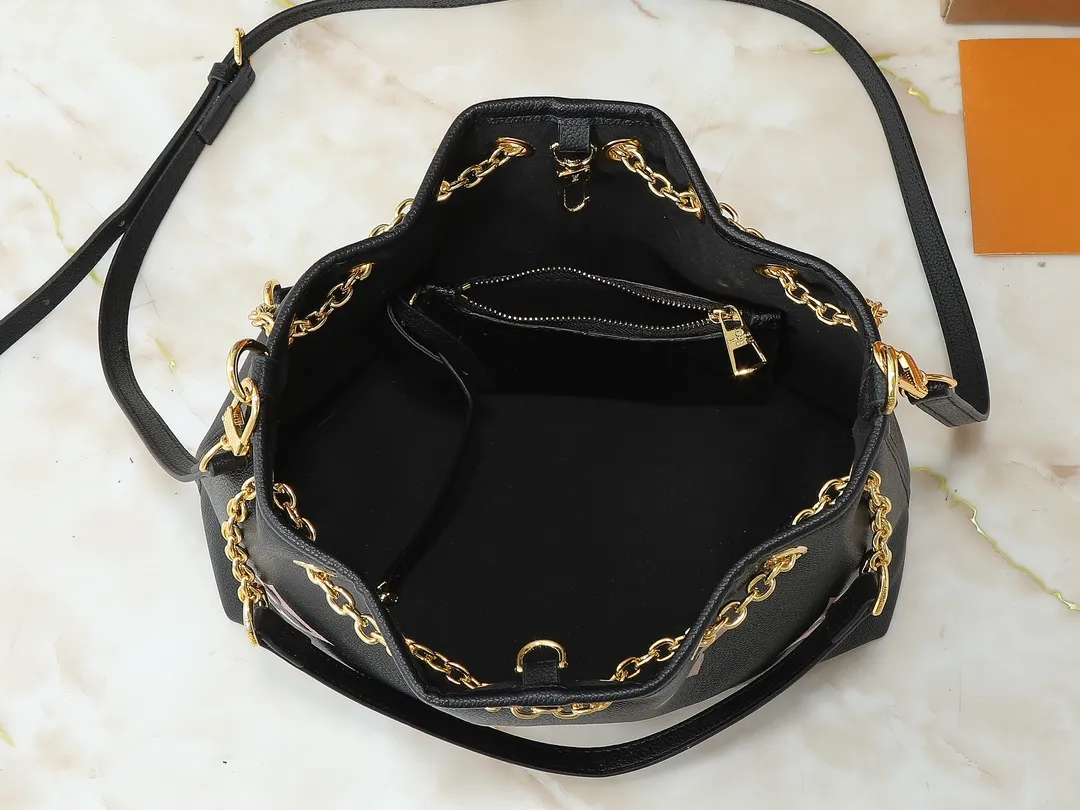 💰260💰Upgraded original version ✨M11283 M25453 M47209 M46545 M46492 This Summer Bundle handbag is from the Dégradé series. The new drawstring design adds a summer atmosphere. The Monogram Empreinte embossed leather bag features a gradient tone to brighten any seasonal look. The double handles and detachable cross-body strap provide a variety of stylish carrying options, making it a great companion for travel day and night. Detailed features: 28 x 20 x 11.5 (Length x Height x Width)