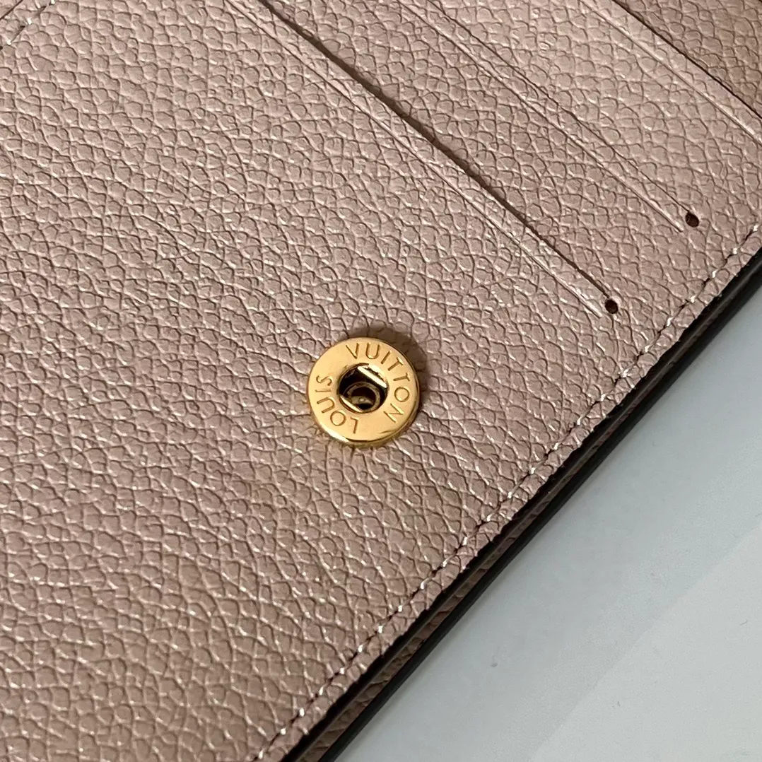 Factory price 480 Top original order M80152 Apricot This Cléa wallet is made of Monogram Empreinte soft grained cowhide, embellished with Louis Vuitton's iconic Monogram embossed pattern. It has a stylish design, is exquisite and compact but has a spacious capacity. It is equipped with an external patch pocket, zipper coin pocket, banknote compartment and six credit card slots. Details 12 x 9 x 3.5 cm (Length x Height x Width) Turtledove beige Soft grained embossed cowhide Leather lining Gold-tone hardware Snap-button closure Compartment for notes Accordion zip coin pocket External patch pocket Inner card compartment 6 credit card slots