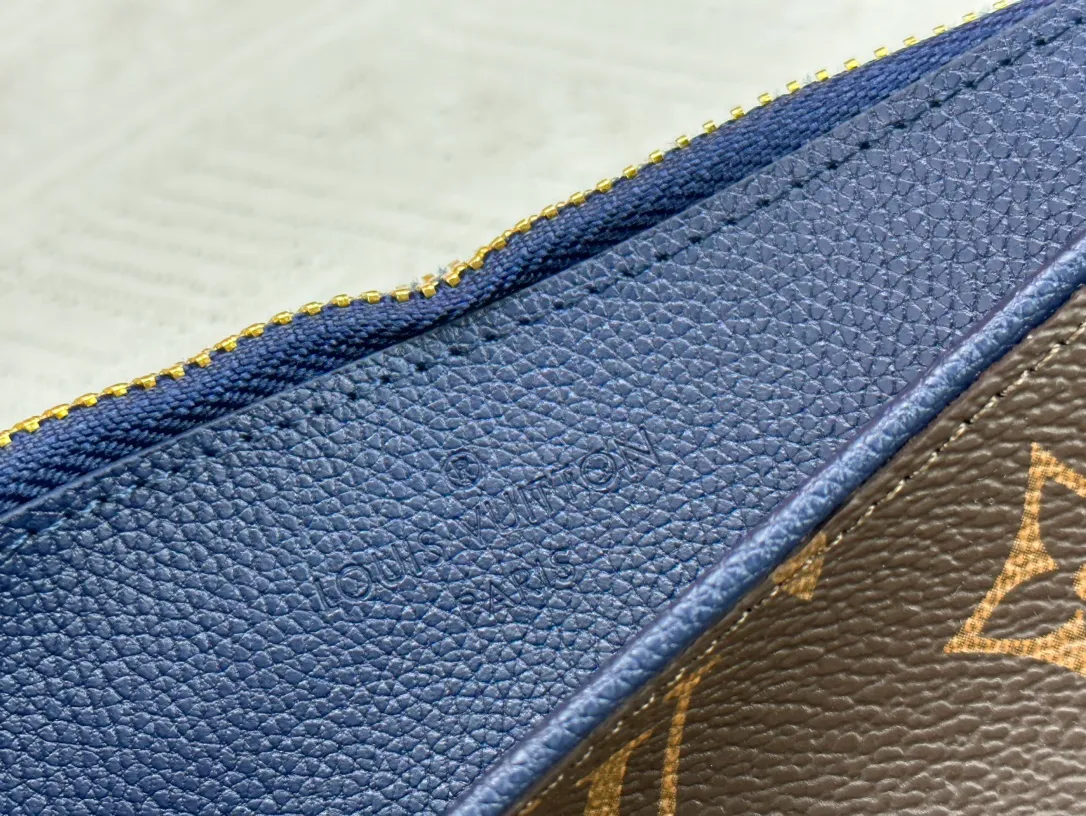 P 120 M60910, actual photo This handbag is exquisitely crafted. The Pallas handbag combines classic Monogram canvas with bright colors to create a pleasing effect. It holds an iPad mini for the ultimate feminine look and fits easily into most Louis Vuitton shoulder bags and tote styles. Carry loop with bright gold-tone brass hardware, calfskin lining, 6 credit card slots and a contrasting external patch pocket. Dimensions: 24x17,