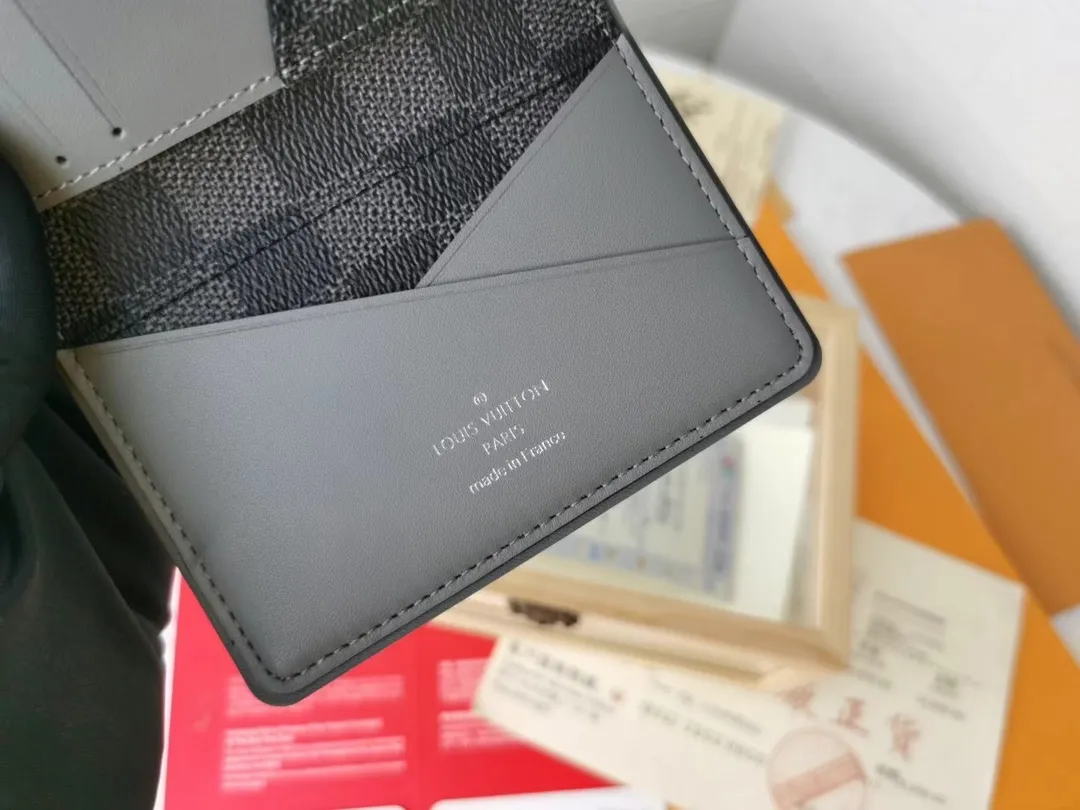 P110💰Top Original💎N63144 black check with yellow, this pocket wallet combines the elegance of Damier Graphite canvas with the delicate texture of Epi leather, with stripes emblazoned with the Louis Vuitton logo. The elegant design can accommodate credit cards, banknotes and receipts, making it suitable for daily carrying or gift giving. Detailed Features 8.0 x 11.0 x 1.0 cm (L x H x W) Epi leather and Damier Graphite coated canvas Coated cowhide leather trim Cowhide lining, card compartment, inner pocket, outer patch pocket This product is made in one of France, Spain, Italy and the United States