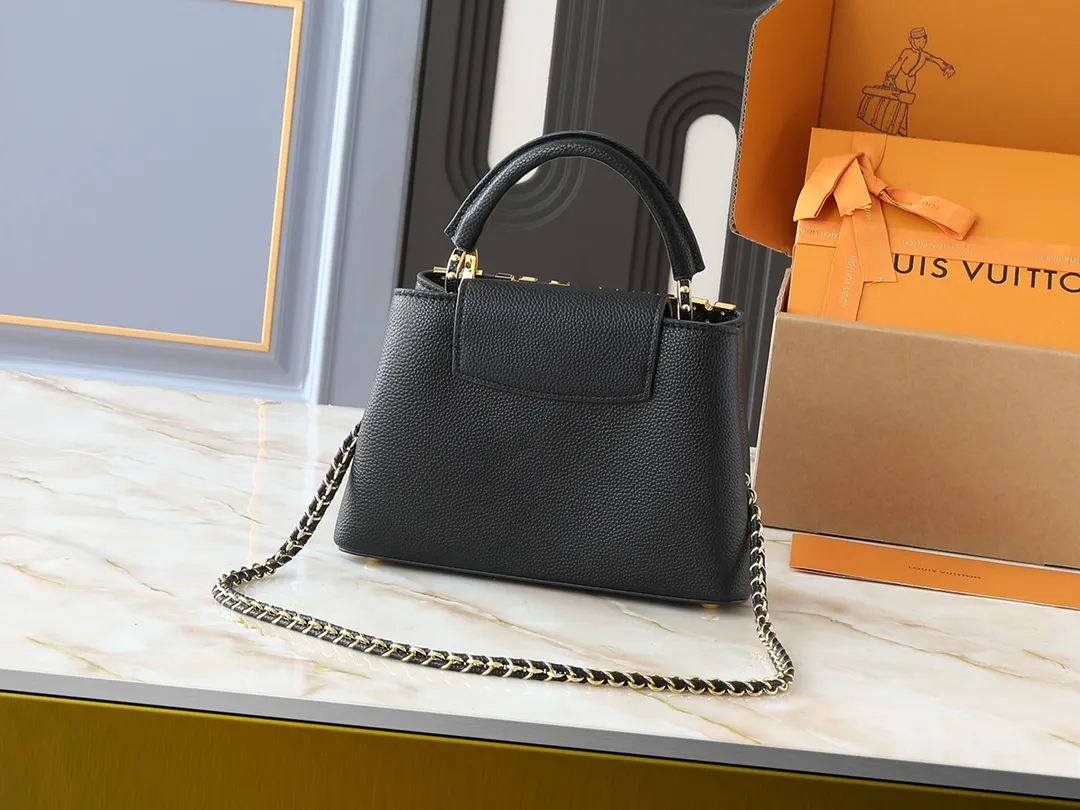 💰420💰Guangzhou product Upgraded from the original M24583 M24584 M24585 Gold and diamond corolla This Capucines Flower Crown handbag is made of full-grain Taurillon leather and is embellished with Monogram flowers. Each flower is shaped by exquisite crystal diamonds. The LV logo and flowers echo each other, giving this soft handbag a jewel-like luster. Use the detachable shoulder strap cleverly to switch between shoulder and crossbody. Dimensions: 27.0 x 17.3 x 9.0 cm