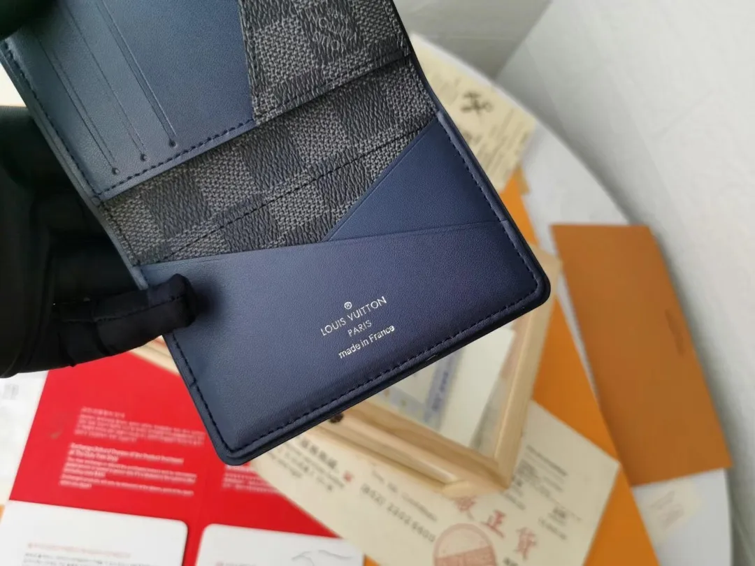 P110💰Top Original💎N63144 black check with yellow, this pocket wallet combines the elegance of Damier Graphite canvas with the delicate texture of Epi leather, with stripes emblazoned with the Louis Vuitton logo. The elegant design can accommodate credit cards, banknotes and receipts, making it suitable for daily carrying or gift giving. Detailed Features 8.0 x 11.0 x 1.0 cm (L x H x W) Epi leather and Damier Graphite coated canvas Coated cowhide leather trim Cowhide lining, card compartment, inner pocket, outer patch pocket This product is made in one of France, Spain, Italy and the United States