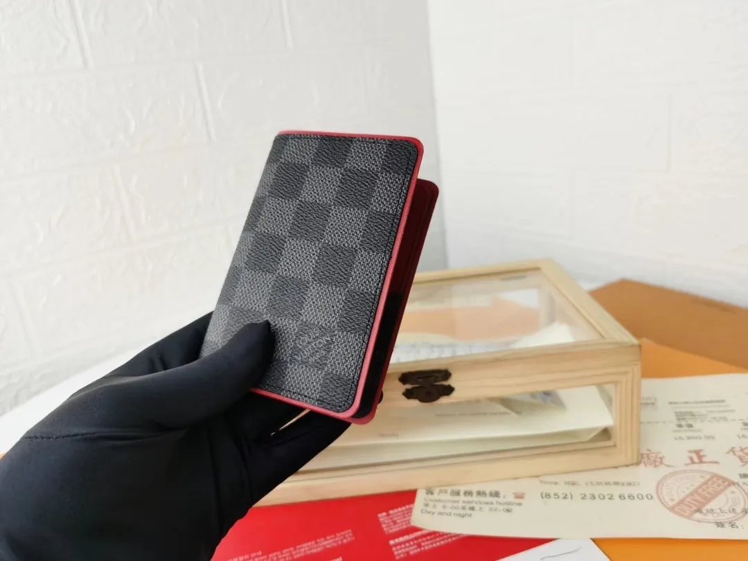 P110💰Top Original💎N63144 black check with yellow, this pocket wallet combines the elegance of Damier Graphite canvas with the delicate texture of Epi leather, with stripes emblazoned with the Louis Vuitton logo. The elegant design can accommodate credit cards, banknotes and receipts, making it suitable for daily carrying or gift giving. Detailed Features 8.0 x 11.0 x 1.0 cm (L x H x W) Epi leather and Damier Graphite coated canvas Coated cowhide leather trim Cowhide lining, card compartment, inner pocket, outer patch pocket This product is made in one of France, Spain, Italy and the United States