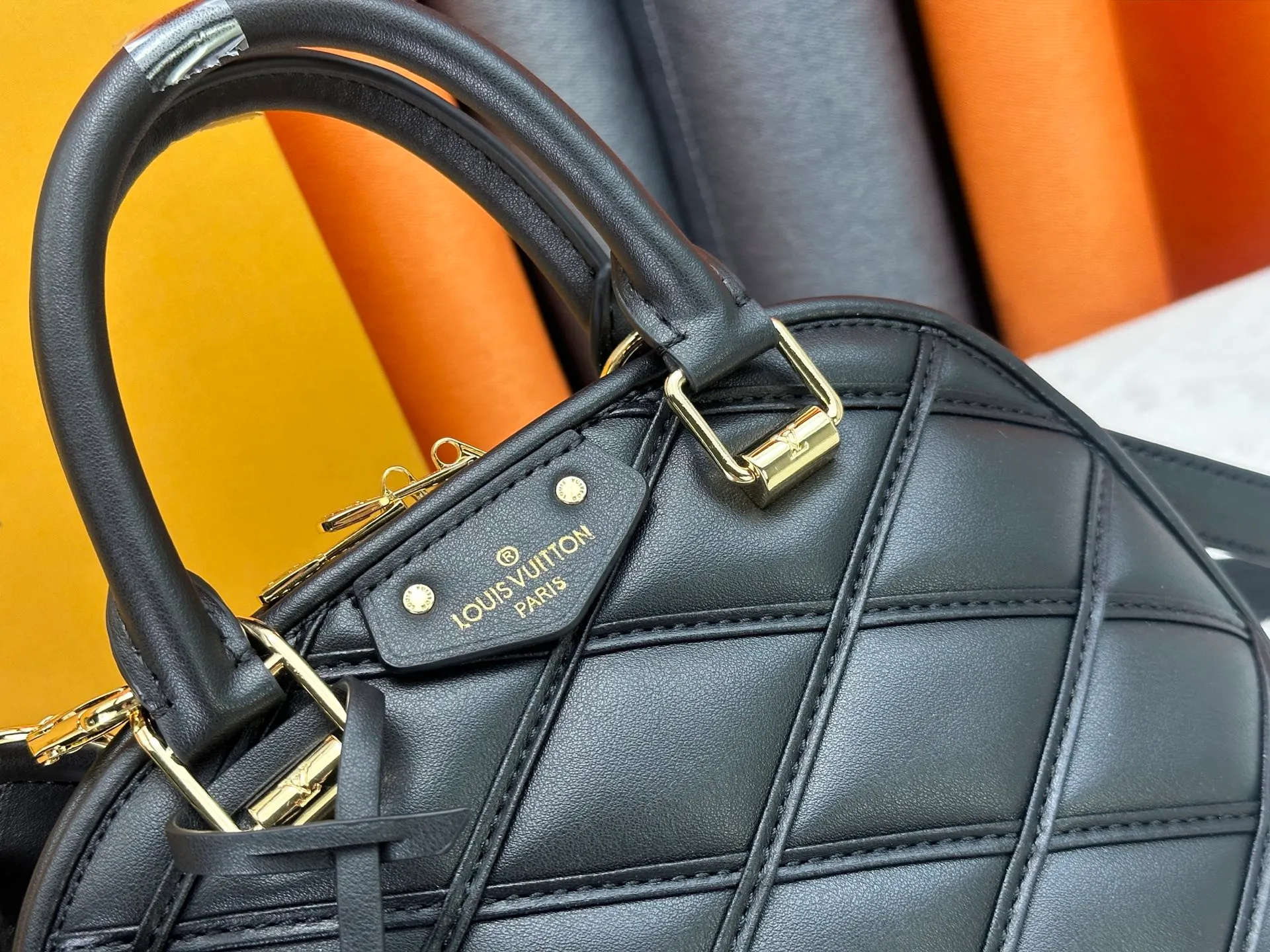 P360 M83048 M53152 This Nano Alma handbag is a pocket-sized version of Louis Vuitton's classic Alma handbag. It is made of soft lambskin with a Malletage quilting pattern, recalling the diamond inner panel of the brand's traditional hard luggage. The elegant handle, dazzling chain and detachable and adjustable leather shoulder strap enable a variety of carrying styles. Dimensions: 23.5x17.5x11.5cm