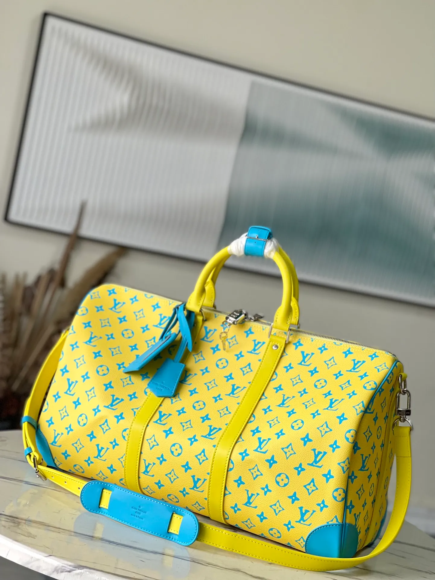 💰1560 (top layer leather) top original order M21869 This Keepall Bandouliore50 travel bag is made of Monogram Playground canvas, with a Monogram pattern that resembles clay sculptures carved in bright colors. Reinforced corners, name tags, and key cases are all made of leather, contrasting with the colors of Monogram flowers and letters. Dimensions: 50 × 29 × 23 am