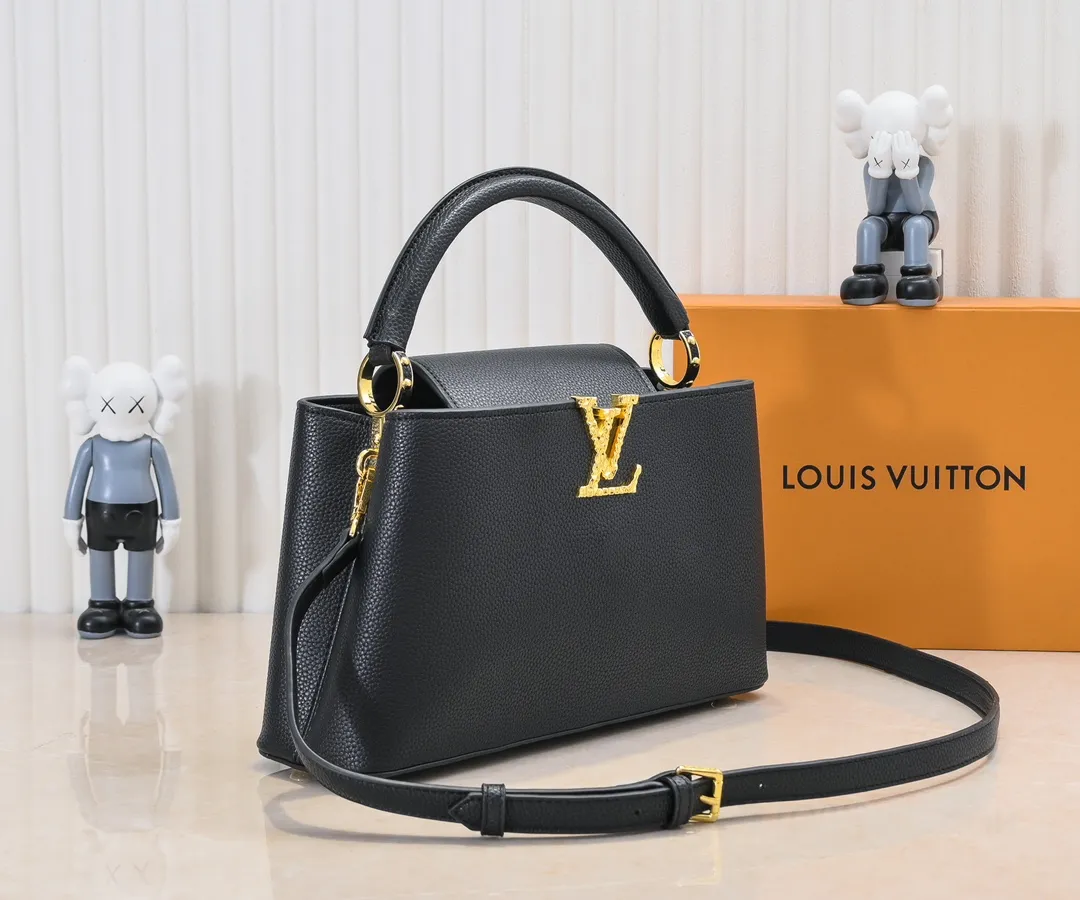 Upgraded version P440 M24664 This medium-sized CapucinesEastWest handbag is from the LVCrush series, with eye-catching forged LV letters lighting up the grained cow leather body. The rolled leather top handle allows for hand or elbow carry, and the adjustable and removable spaghetti strap makes it easy to carry over the shoulder. Personalized Gift Detailed Features 33 x 19 x 9 cm (Length x Height x Width)