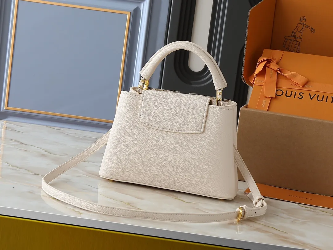 💰400💰Guangzhou goods Upgraded from the original M12135 M11964 M12751 This Capucines BB handbag is made of Taurillon cow leather, decorated with mixed metal rhombus Malletage elements on the upper edge, showing a gorgeous interpretation of the classic design. The flap allows for an external or internal style, the neat interior features multiple pockets, and the adjustable shoulder strap adds a cross-body option to the top handle. 27.0 x 17.3 x 9.0 cm (length x height x width)