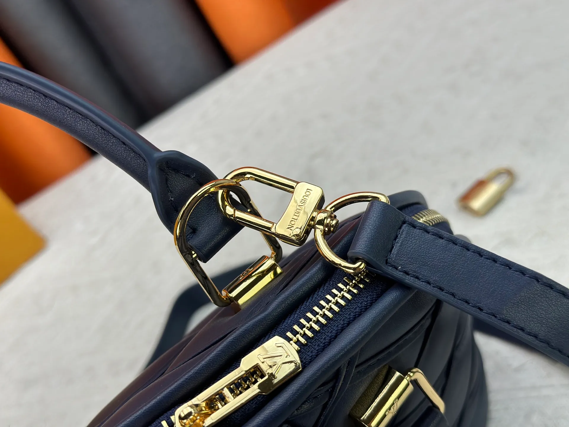 P360 M83048 M53152 This Nano Alma handbag is a pocket-sized version of Louis Vuitton's classic Alma handbag. It is made of soft lambskin with a Malletage quilting pattern, recalling the diamond inner panel of the brand's traditional hard luggage. The elegant handle, dazzling chain and detachable and adjustable leather shoulder strap enable a variety of carrying styles. Dimensions: 23.5x17.5x11.5cm