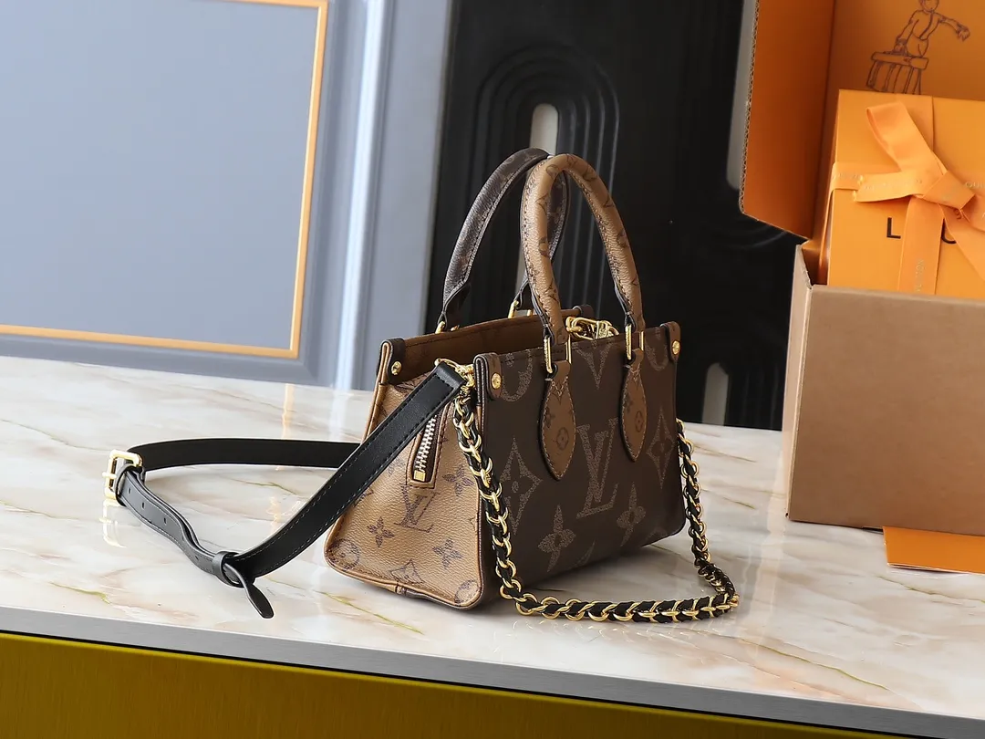 💰240💰Upgraded original M14236 M14213 M46653 This OnTheGo East West handbag uses coated canvas to present the Monogram Giant element, which is combined with the Monogram Reverse coated canvas trim and bright metal parts to create an elegant style. The top handle, detachable chain and removable and adjustable shoulder strap allow for a variety of carrying options, while multiple compartments and pockets keep valuables organized. Dimensions: 25.0 x 13.0 x 10.0 cm (length x height x width)