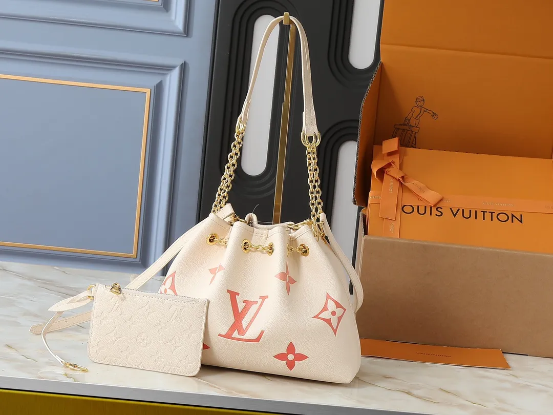 💰260💰Upgraded original version ✨M11283 M25453 M47209 M46545 M46492 This Summer Bundle handbag is from the Dégradé series. The new drawstring design adds a summer atmosphere. The Monogram Empreinte embossed leather bag features a gradient tone to brighten any seasonal look. The double handles and detachable cross-body strap provide a variety of stylish carrying options, making it a great companion for travel day and night. Detailed features: 28 x 20 x 11.5 (Length x Height x Width)