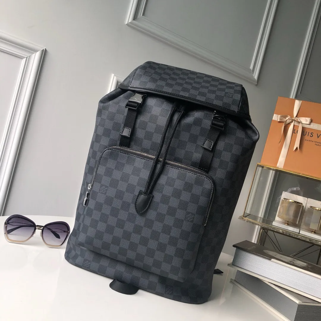 💰1040 Actual photos of the top original item 😍😍 N40005 ZACK Backpack This sports-style coated canvas Zack backpack is full of capacity and shows classic Louis Vuitton style. The flap, drawstring and metal buckle are all classic Louis. Vuitton design elements. - 45 x 30 x 20cm (Length x Height x Width) - Exterior in Louis Vuitton specially coated canvas - Textile lining - Cowhide leather trim - Silver metal hardware - Top handle - 2 leather shoulder straps - Flap + drawstring + buckle - 1 lined interior compartment - 1 double interior patch pocket.