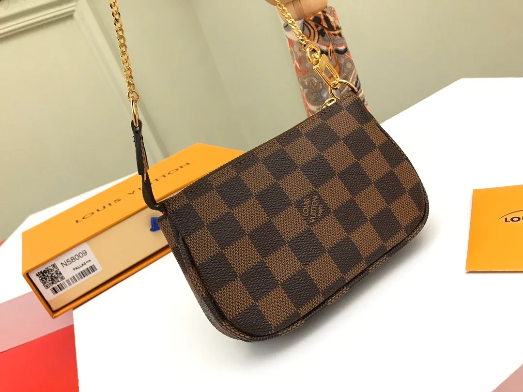 Factory price 240 [Top original order] N58009 Brown 👏👏 This accessory bag opens with a zipper and comes with a gold chain, which can be attached to the D-ring on most Louis Vuitton handbags. Size: 15.5x10.5x4.0cm, packaging: with box