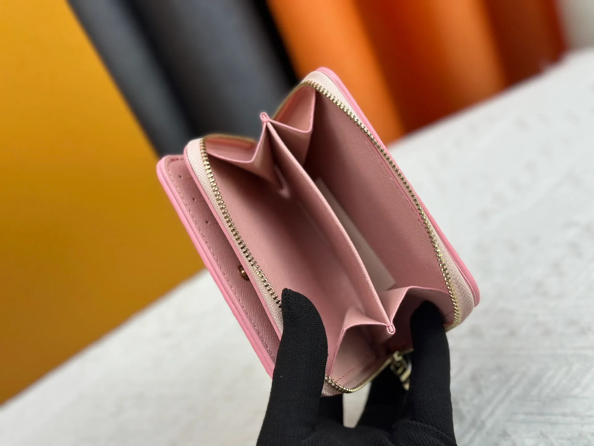 P140, M83689 83160 This Cléa wallet is made of Monogram Empreinte soft grained cowhide, embellished with Louis Vuitton's iconic Monogram embossed pattern. It has a stylish design, is exquisite and compact but spacious. It is equipped with an external patch pocket, zipper coin pocket, banknote compartment and six credit card slots.