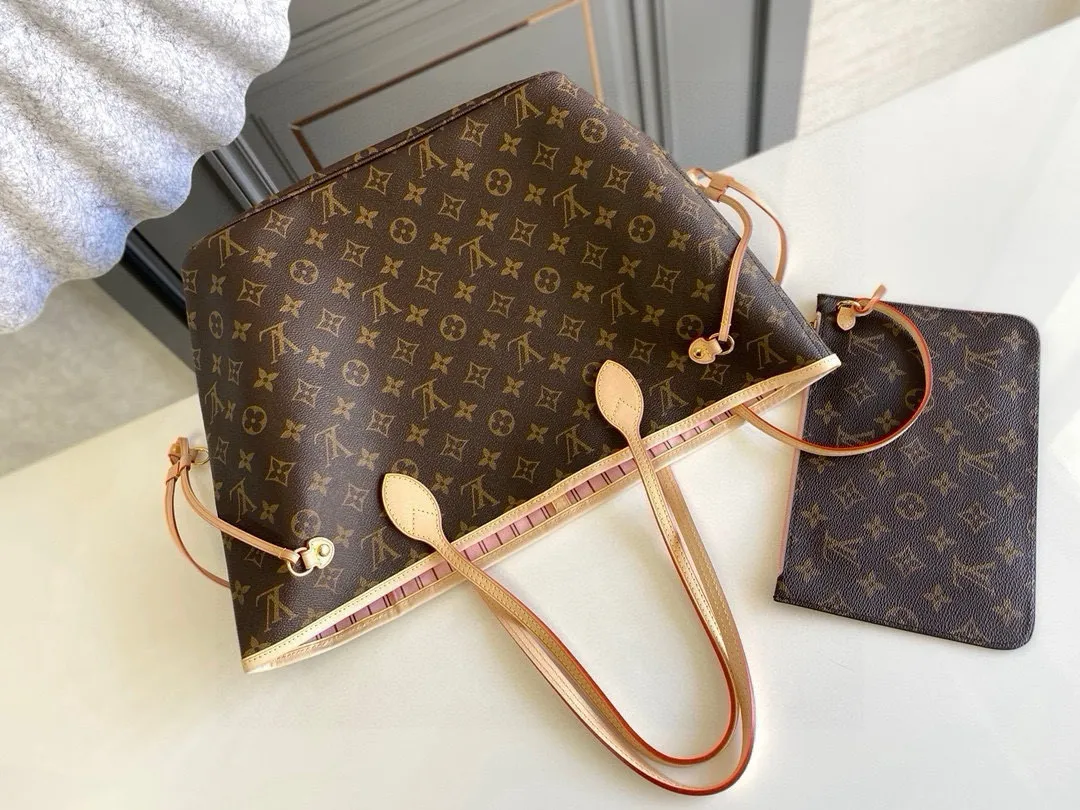💰760 (medium steel nails) top original order M50366 NEVERFULL medium handbag Neverfull classic handbag, explore the exquisite details inside the bag. The redesigned interior pockets feature a fresh fabric lining, especially the detachable zippered clutch, which can be used alone as a sophisticated clutch or as an additional pocket. Bright lining tones add a more lively feel to Monogram's classic canvas. Detailed features 31 x 28 x 14 cm (Length x Height x Width) Redesigned interior pocket with details inspired by the Louis Vuitton archives Pocket lined with linen fabric Removable zipped clutch with tonal interior pocket Natural cowhide leather trim Shiny gold-tone hardware Handles: Double handle