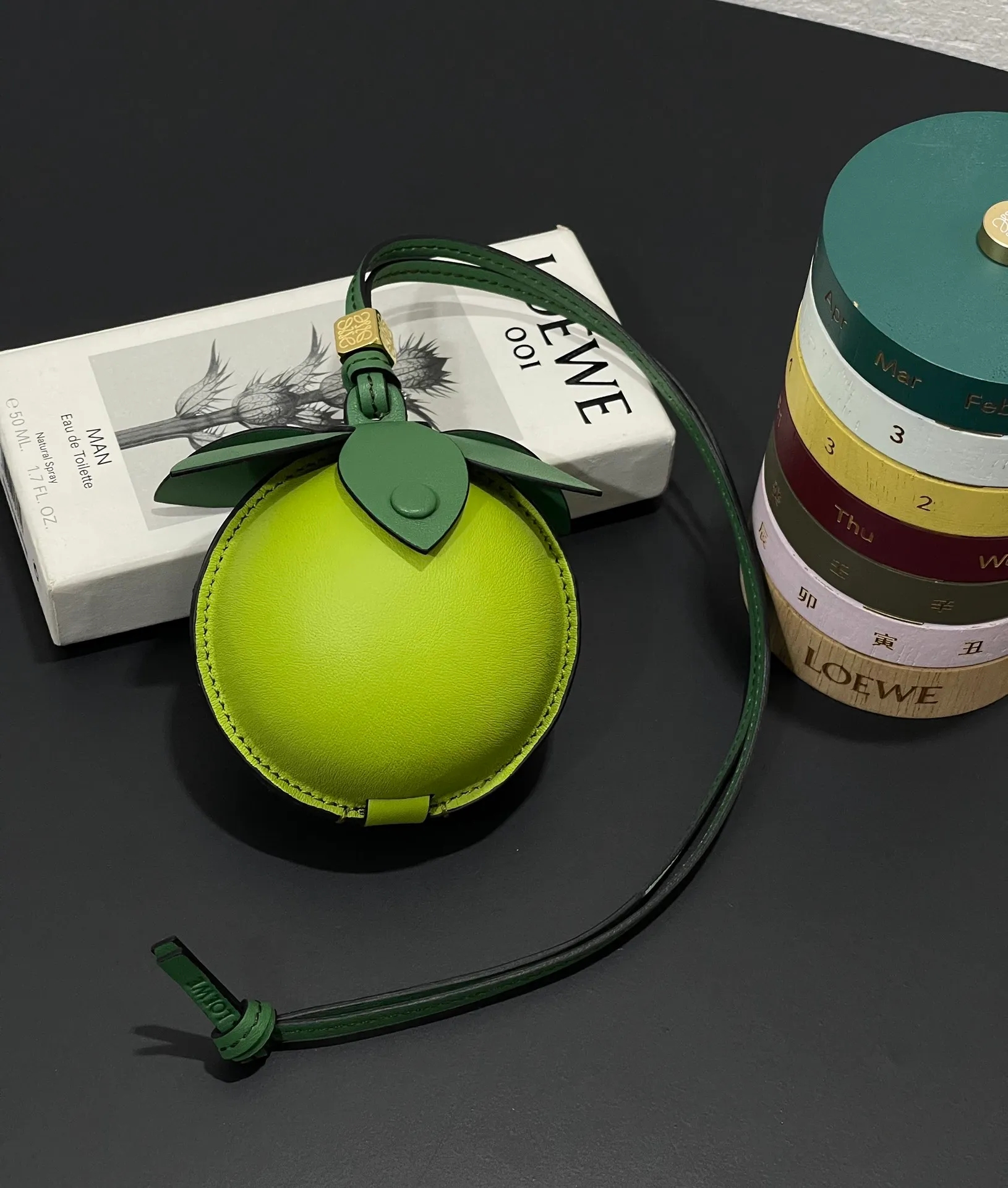 💰880 Big Lime 🍋 Small bag pendant is made of calfskin with contrasting colors and fastened with snap buttons. It can hold some small items and change inside, and can be hung on the neck or bag.    Style No. 327 Size 12*11 (cards cannot be placed)