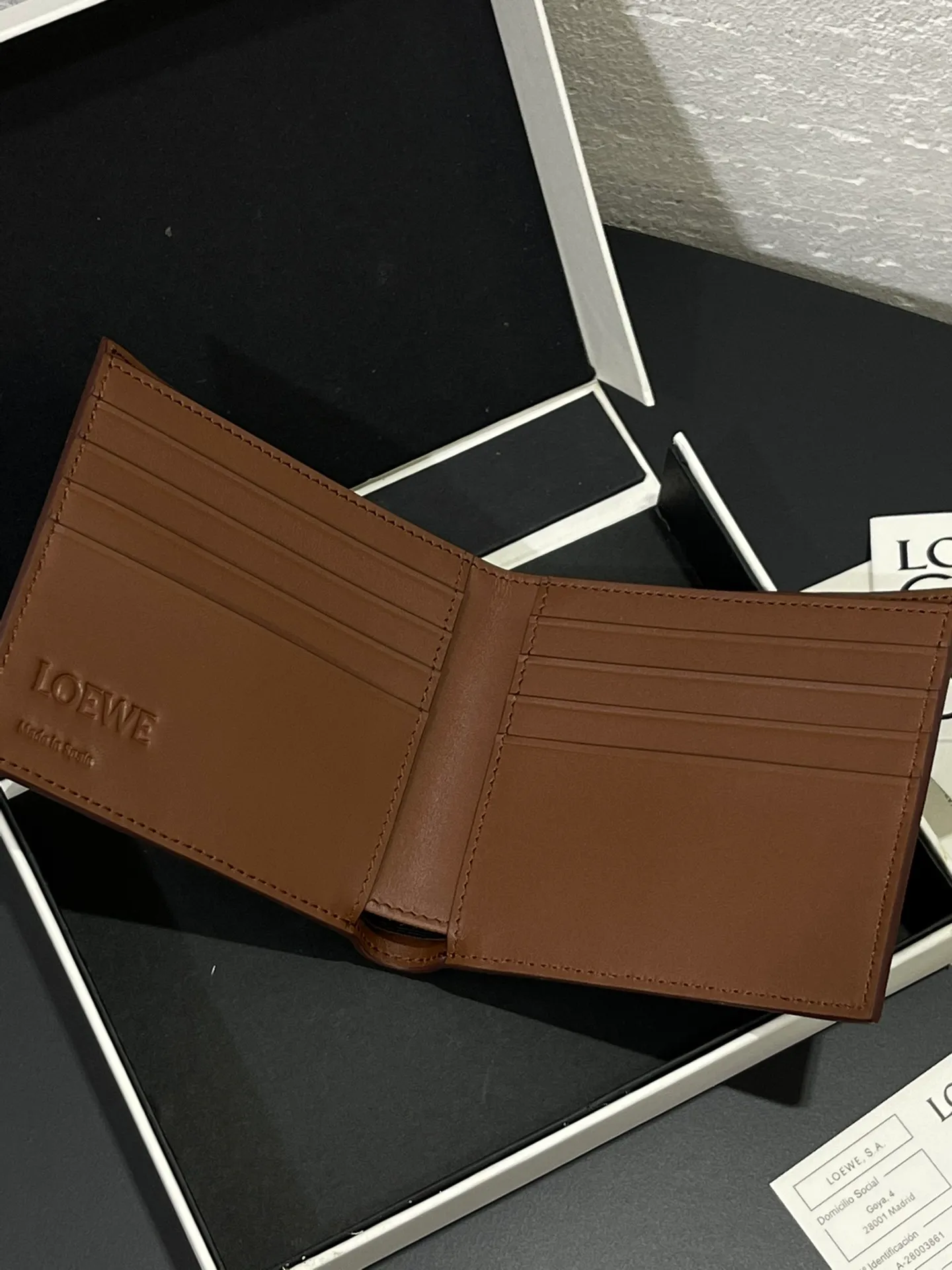 Men's bifold wallet is shipped. The wallet is inspired by the puzzle series handbags. It adopts a unique geometric pattern. It is made of classic calfskin. It has eight card slots and two large pockets. Style number 3801. Size 11*10 💰330