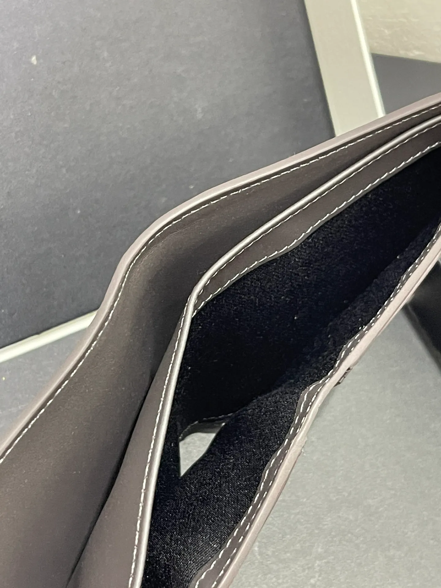 Men's bifold wallet is shipped. The wallet is inspired by the puzzle series handbags. It adopts a unique geometric pattern. It is made of classic calfskin. It has eight card slots and two large pockets. Style number 3801. Size 11*10 💰330