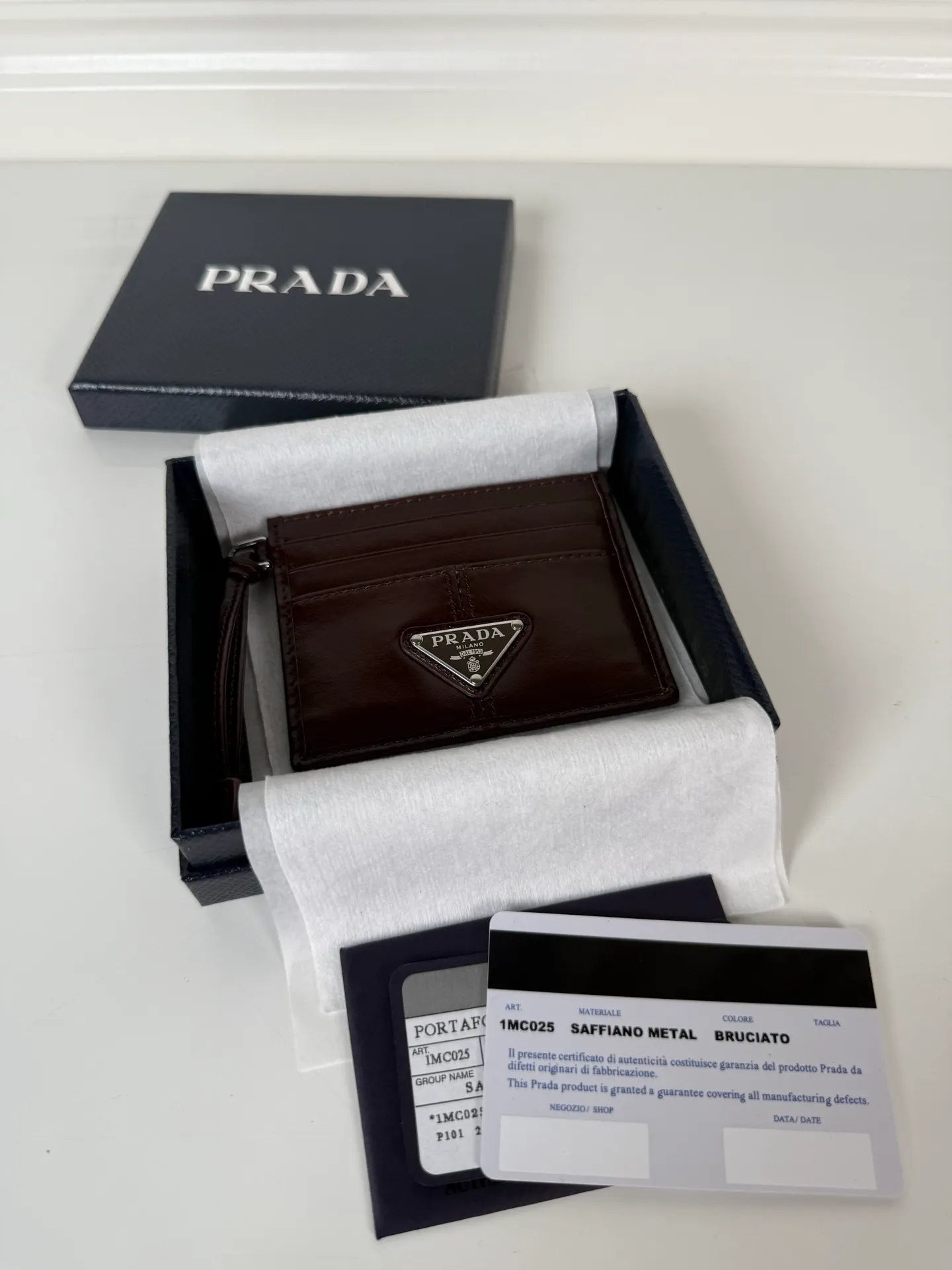💰340, P Home ➡️ Small card holder for men and women, coffee color waxed leather triangle mark, model 1MC025, original quality, made of imported waxed leather, 6 card slots ➕ One middle compartment, can hold multiple cards and zeros 💰, size 11.2×8.5cm, taken in kind, what you see is what you get