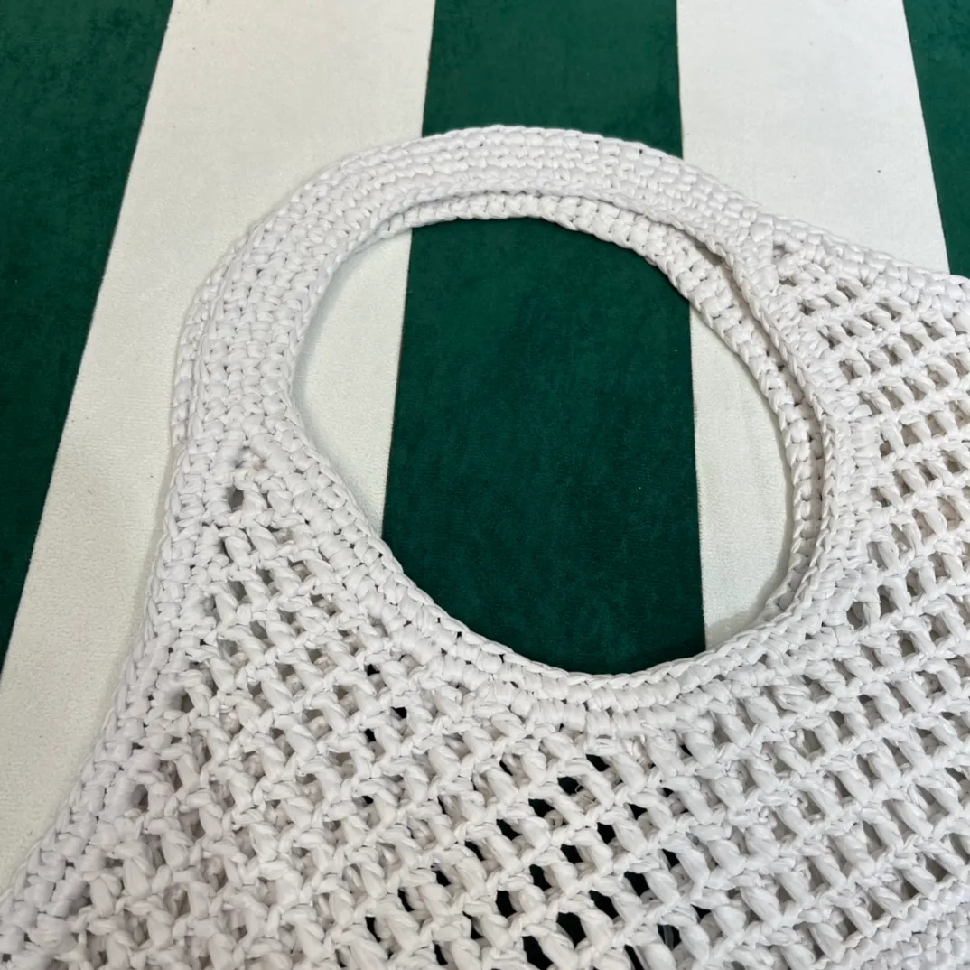 💰1360{White｝🐚 Prad* new hollow straw tote! Full of artistic atmosphere ~ The raffia weave is very solid and has a great texture. ♡ It can be paired with personal clothes every day. The natural style design makes it seem like it can breathe💭 If you like the baby, quickly add it to the harem. Carry an exclusive style that will not go out of style for several years🌱1BG424 Size: Height 45x Width 51cm