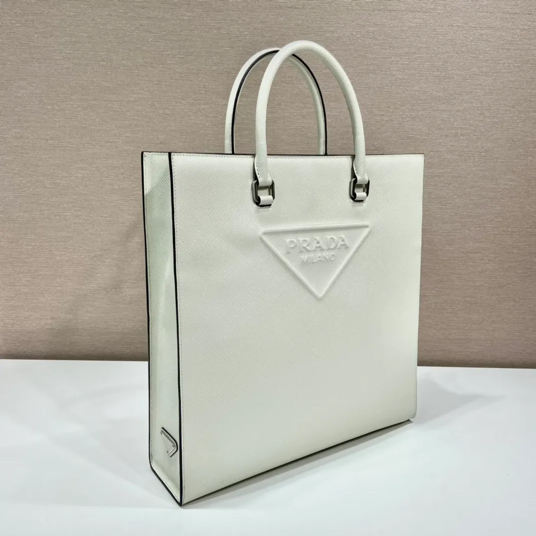 💰2040🎉Embroidered webbing tote bag🎉2VG084🎉🎉New color🎉🎉 This stylish and simple tote bag is made of imported Saffiano leather, with a large embossed logo and unique cross parallel lines. My favorite is this detachable embroidered webbing, which can also be matched with other bags🎉🎉Simple and elegant, fashionable, full of street fashion👏👏 Length 37x Height 37x Bottom 9cm