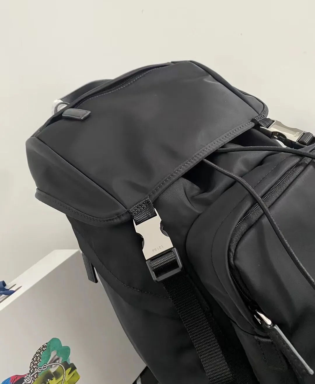 P900¥ [strong], top original quality [celebration] ✨Classic hot style✨ The latest Pr@da men's backpack 2VZ135 Triangular enamel nameplate logo Imported original parachute fabric Using imported equipment ✈️ + original hardware accessories Adjustable nylon shoulder straps Flip strap closure and internal drawstring closure Perfect details on the back padding 😘With OEM code Size 17*27*45 Fashionable and casual, a must-have for fashionistas [deyi][deyi] It will be shipped soon [deyi][deyi]