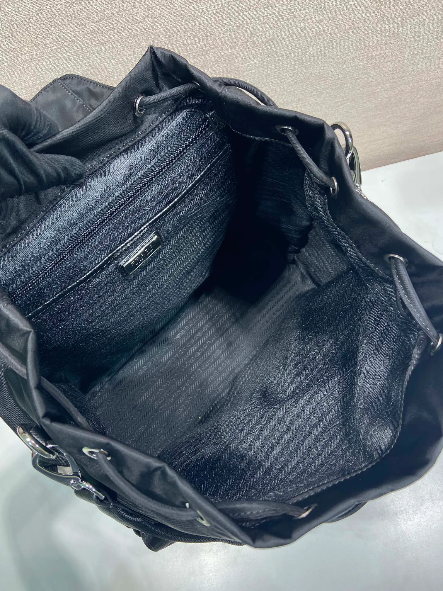 💰1360🎉New Backpack🎉2VZ110A Double Shoulder Strap🎉🎉 This Re-Nylon backpack is designed with classic nylon fabric, top-grade hardware, and integrated with innovative and practical elements, presenting a refined and timeless style. Equipped with a detachable shoulder strap, it can be used interchangeably on different occasions. The upper body effect is very fashionable and elegant, and it is a popular style that will never go out of style🎉Hurry up and get it🎉🎉 Length 34x Height 39x Bottom 15cm🎉🎉🎉🎉👏👏👏