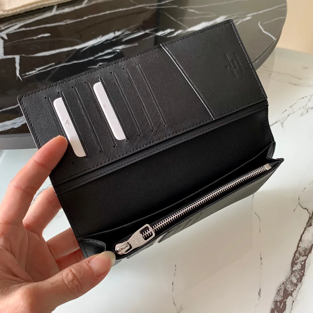 P¥320👉nfc dynamic chip version👈【Top original pure steel hardware】💕 M58192 black litchi pattern long clip suit clip Elegant word is the best way to describe Brazza, a wallet that is both flexible, easy to use and elegant, and can be easily stored in the chest pocket. Crafted from extremely soft yet durable Taurillon leather, this wallet is even more attractive.  Details 10 x 19 x 2 cm (length x height x width) Cowhide inlay Wallet with Louis Vuitton initials embossed on the front Brass hardware with palladium finish Cowhide lining 12 credit card slots, 1 for ID or business cards 1 large zippered coin compartment 4 internal slip pockets for banknotes, IDs, receipts