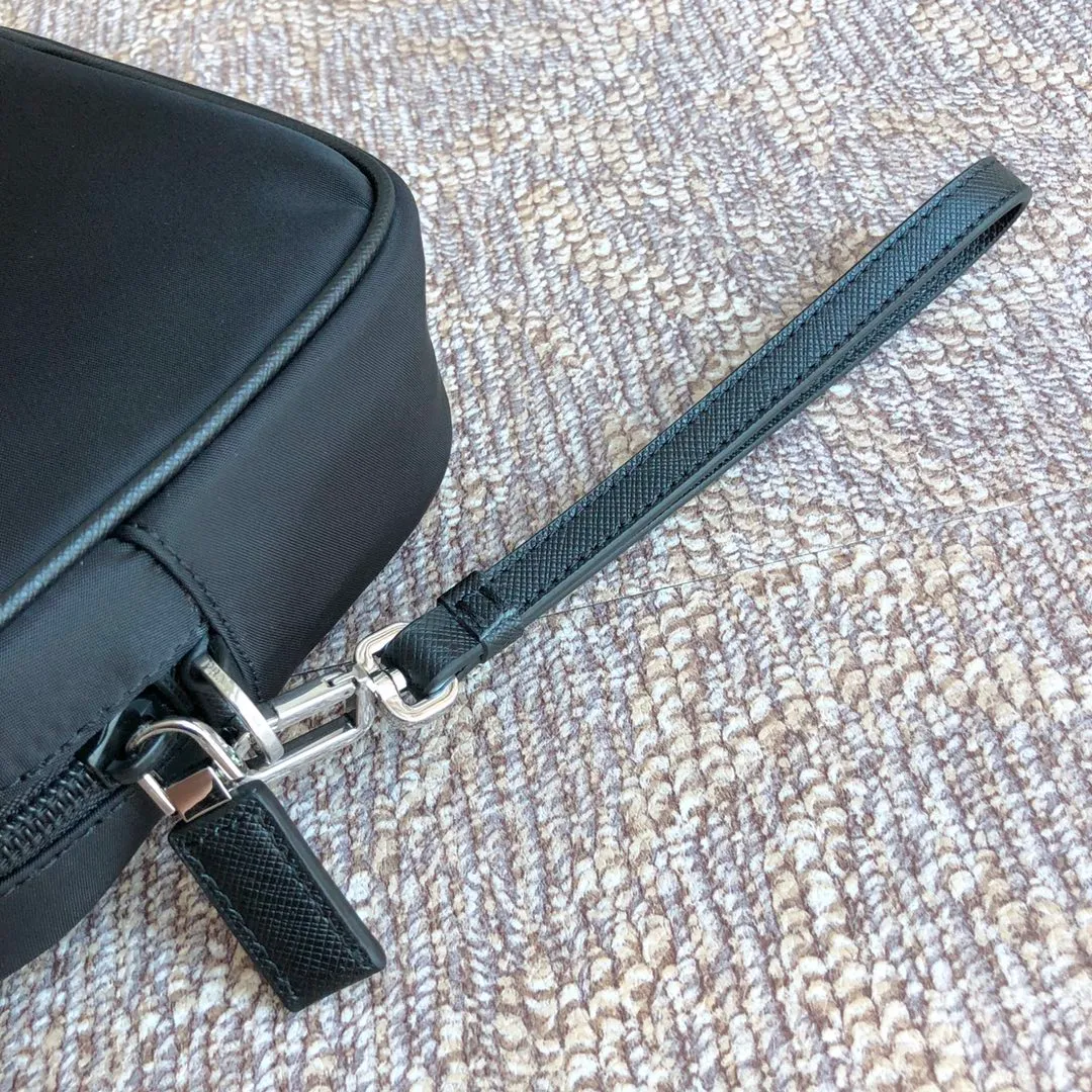 💰700, popular handbag 👍👍2NE007 triangle, made of imported nylon material/cross pattern cowhide, 👍👍polished steel hardware, detachable handle Belt, zipper on the back, many compartments, large capacity, high-end and elegant👍👍Men’s favorite, length 24x height 16x bottom 7cm.👏🏻👏🏻👏🏻