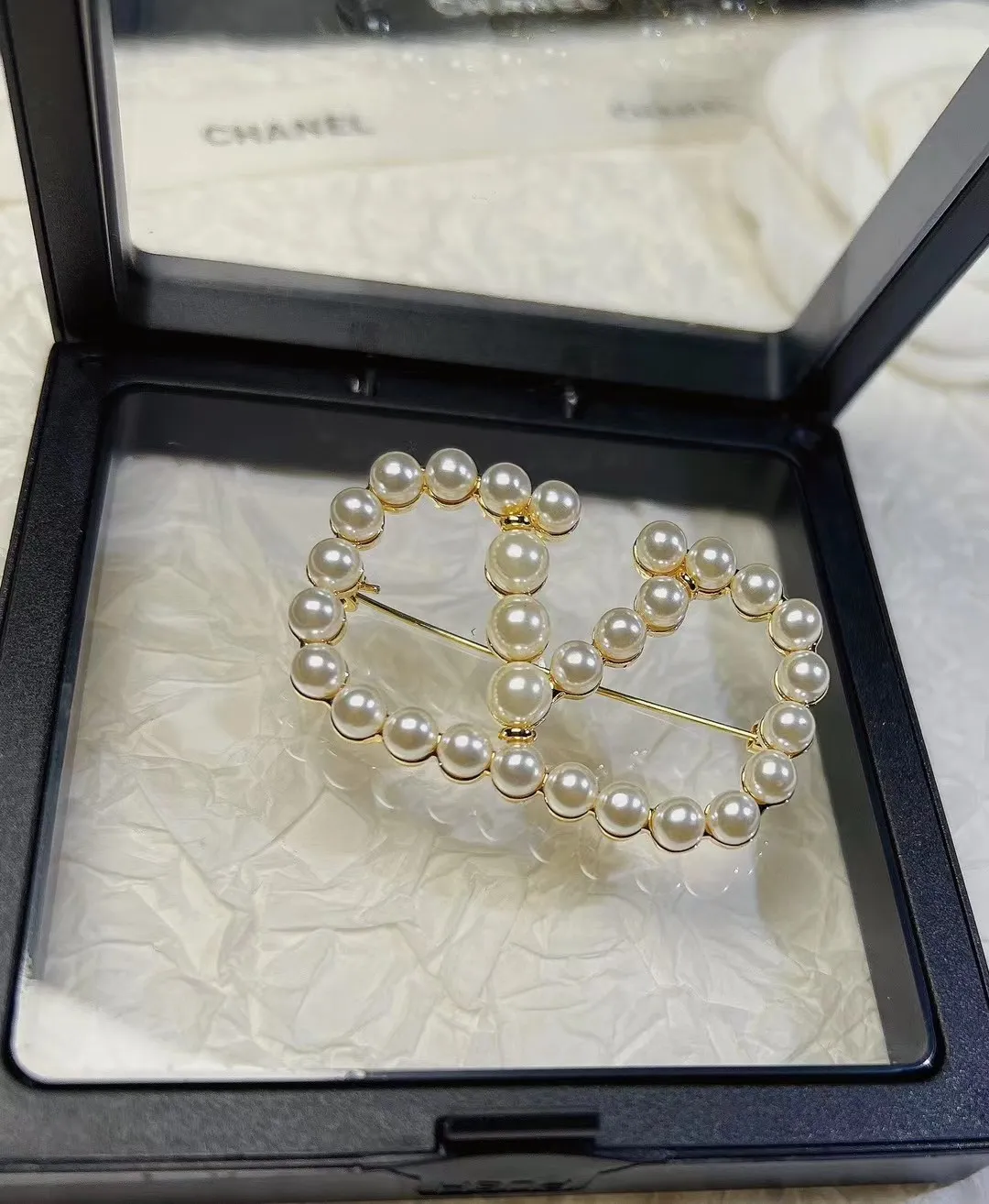 Valentino brooch