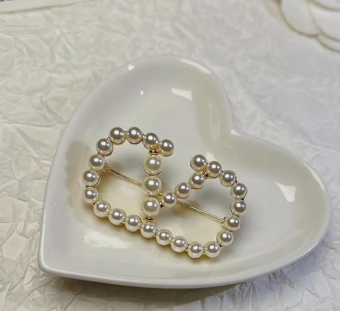 Valentino brooch