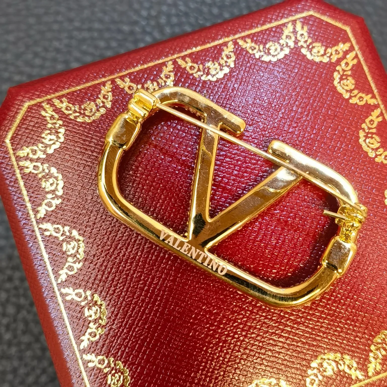 Valentino brooch