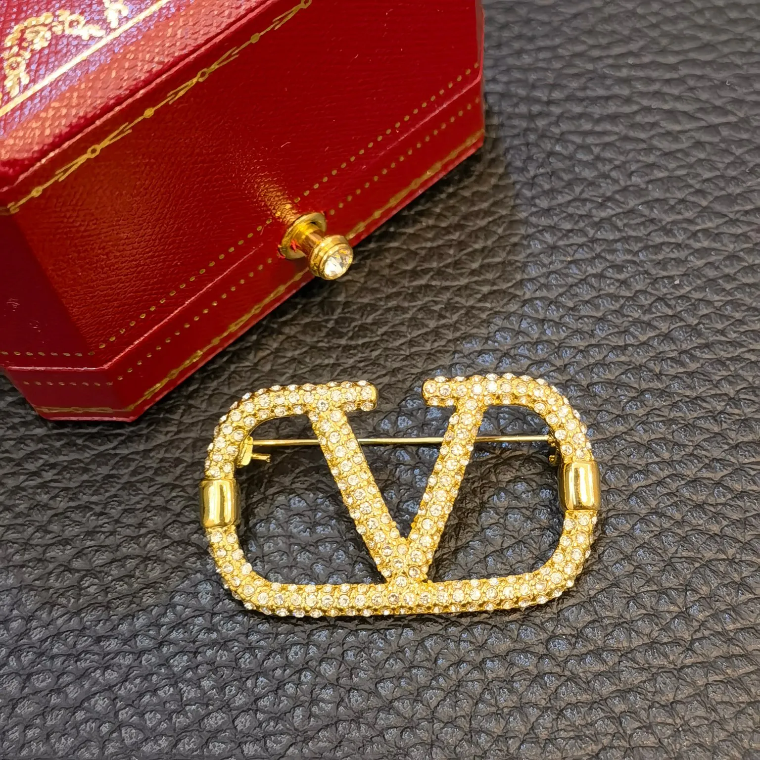 Valentino brooch