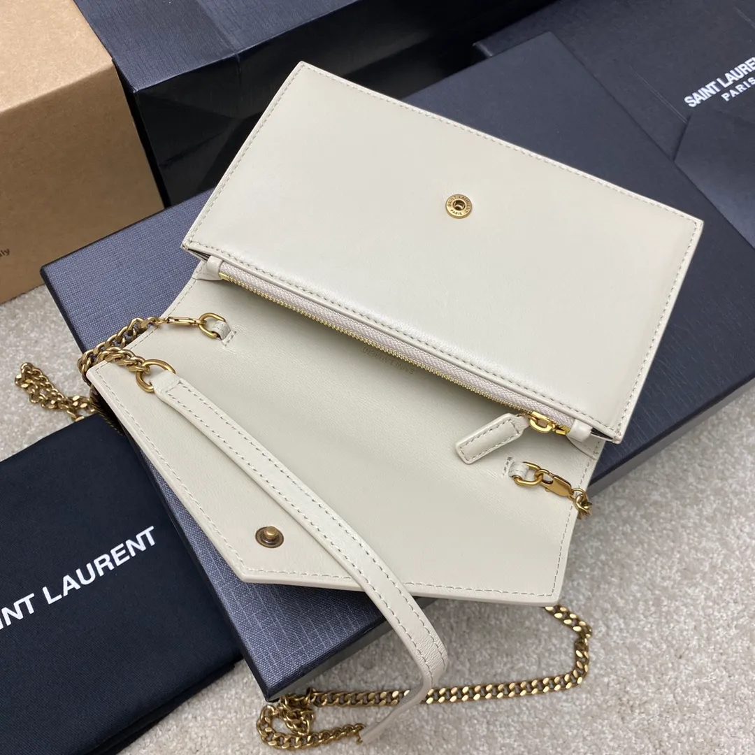 p1220 The top product on the market, white sheepskin/gold 🌈Y’s new product LE CASSANDRE smooth leather envelope chain wallet, made of Italian imported lambskin, soft to the touch! Front flap wallet, decorated with three-color metal logo, super nice! LECASSANDRE interior: six card slots, one bill slot, one main compartment, and one zippered coin pocket, practical and stylish! 20230610 Model: 743050 [original leather] Size: 19x12.5x3.5cm