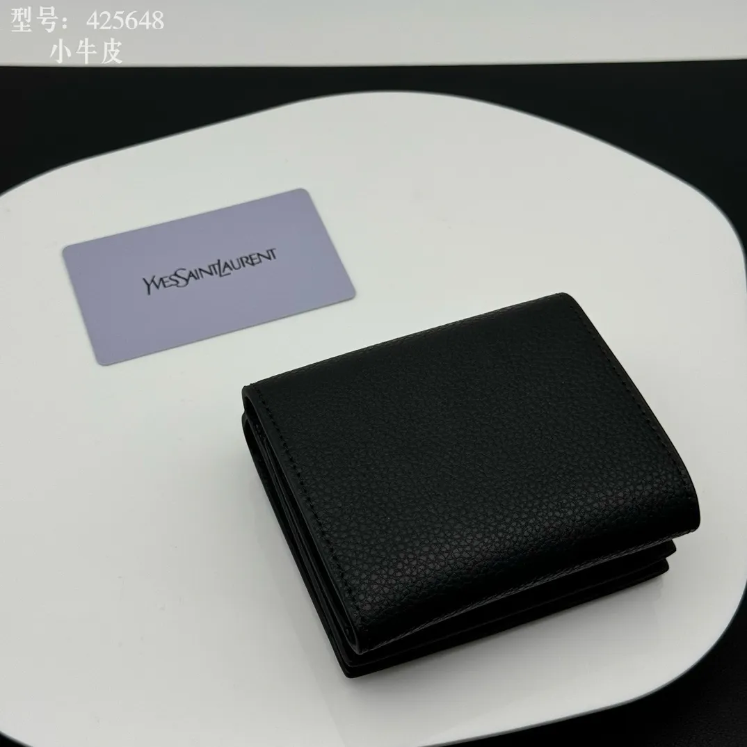 💰170 💎Top quality 💕 Full leather inside and outside "Saint Laurent" YSL 💌 Tri-fold small wallet Black leather grain gold Impressive mini wallet with metal YSL logo mounted on the leather ring. Gold Metal Accessories Shutter Button Closer Inside: Wallet 1 Card Slot x 3 Outside: Coin Pocket with Shutter Button x 1, Dimensions: 9.5 X 7 X 3 CM, Style No.: 425648