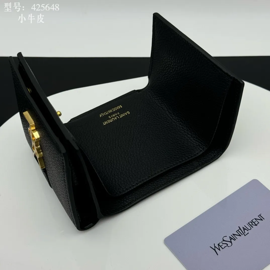 💰170 💎Top quality 💕 Full leather inside and outside "Saint Laurent" YSL 💌 Tri-fold small wallet Black leather grain gold Impressive mini wallet with metal YSL logo mounted on the leather ring. Gold Metal Accessories Shutter Button Closer Inside: Wallet 1 Card Slot x 3 Outside: Coin Pocket with Shutter Button x 1, Dimensions: 9.5 X 7 X 3 CM, Style No.: 425648