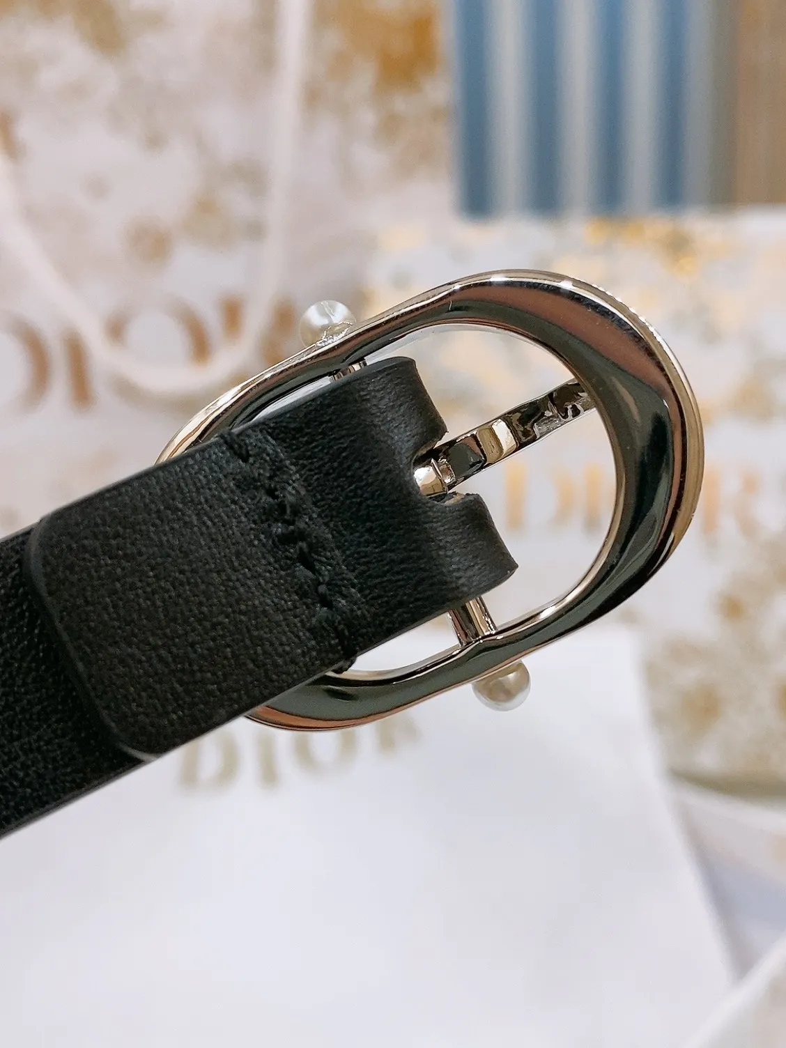 💰440💰Full package💰 💍Consignment grade Dior 20mm black smooth calfskin and silver-toned crystals Dior Chic belt buckle engraved with CD logo White resin beads Christian Dior Paris signature on inner side Lustrous gold-finish metal details Calfskin, brass