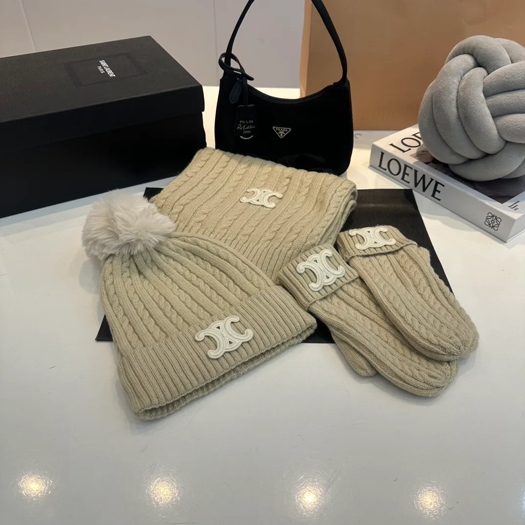 P190 CELINE [Wool Suit Scarf + Gloves + Hat -] Classic suit hat wool cashmere knitted hat with gloves, warm and super comfortable for winter. Celine's three-piece set of gloves, scarves and hats is so high-end. It feels particularly delicate, with impeccable texture and quality. The details are also handled very well. It's warm and comfortable. It's a magical tool for young ladies to reduce their age. Warm and fashionable! Scarf: 185/35cm, head circumference around 57cm, contains 70% wool fabric, complete internal standards.  The latest technology, one-piece molding, is super beautiful. The autumn and winter wool knitted beanie feels good to the touch ~ the color is super white ~ and it has a good atmosphere when taking photos. Multiple colors are matched and very versatile ~