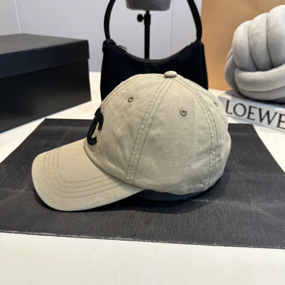P60 Chanel Chanel 25 spring and summer new hole baseball cap, personalized broken corner brim design is full of sense