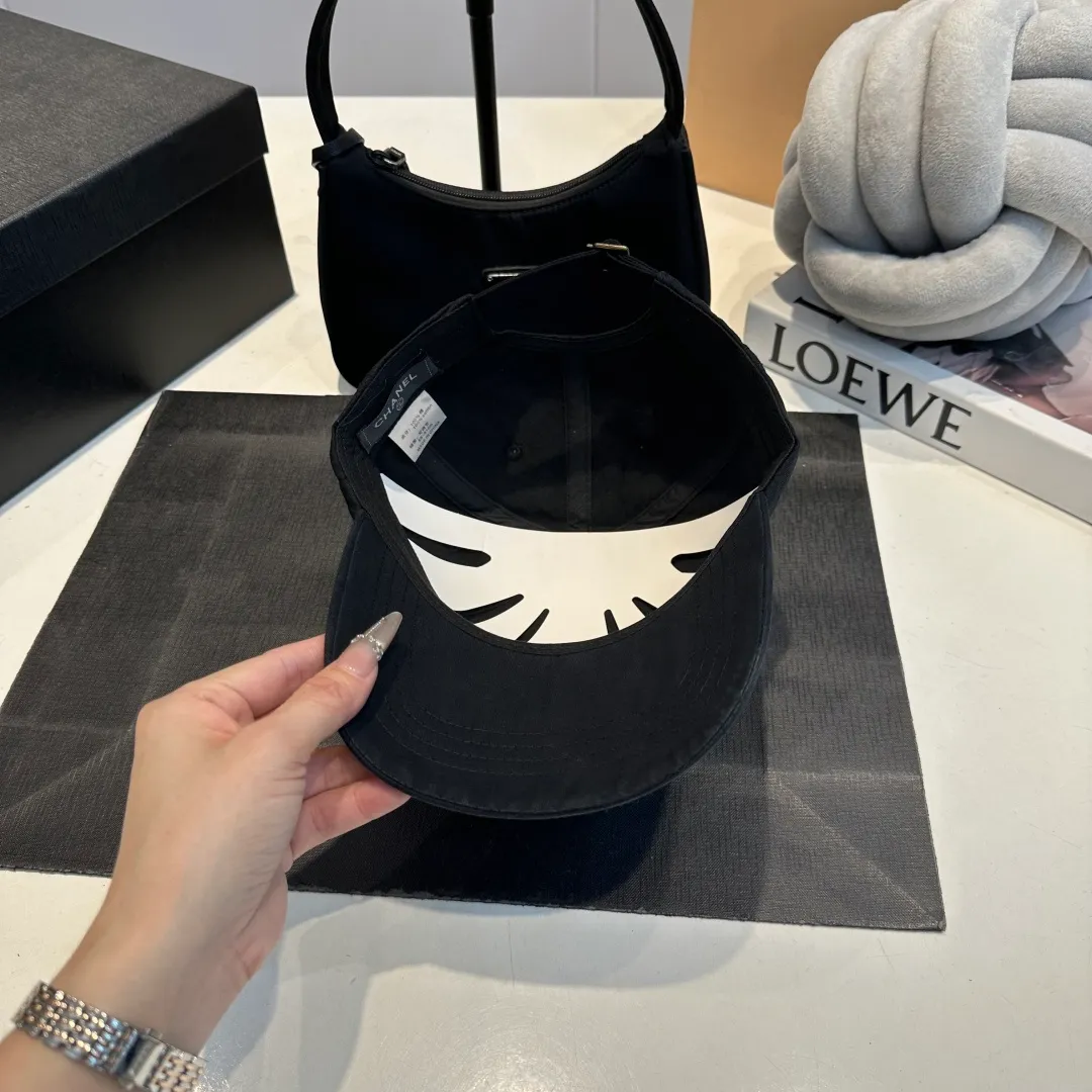 P60 Chanel Chanel 25 spring and summer new hole baseball cap, personalized broken corner brim design is full of sense