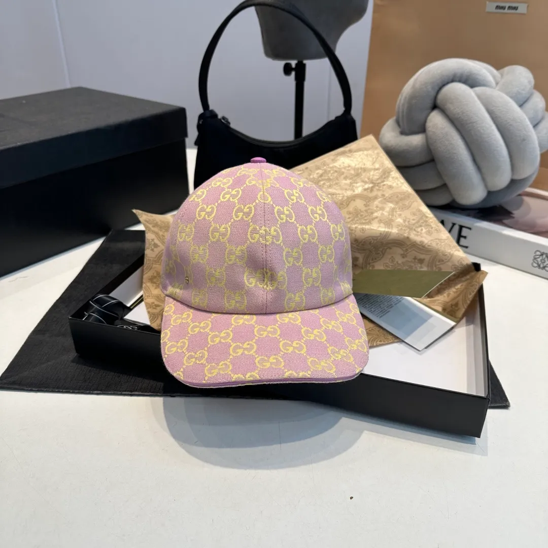 P240 Gucci Baseball Cap🧢Gucci’s classic pattern shines in this fashionable item embellished with the brand’s logo. This baseball cap is crafted from the brand's recognizable GG canvas fabric, with tonal leather details and an adjustable buckle adding to the appeal. Product details ·Pink GG canvas ·Pink leather piping ·Cotton and linen lining ·Adjustable Velcro closure ·70% cotton, 30% polyester; 65% cotton, 35% linen (lining); 55% cotton, 45% viscose (inside); Cow leather (detail); Cow leather (leather piping)