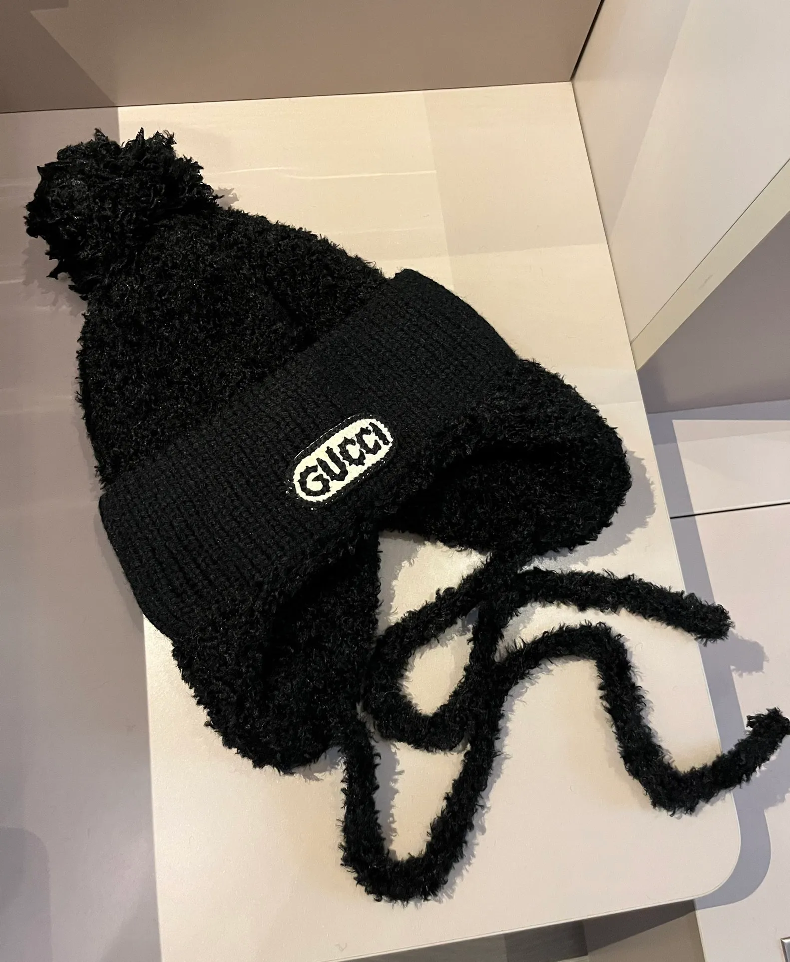 Gucci knitted ear protection beanie