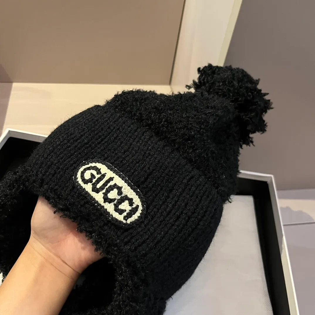 Gucci knitted ear protection beanie