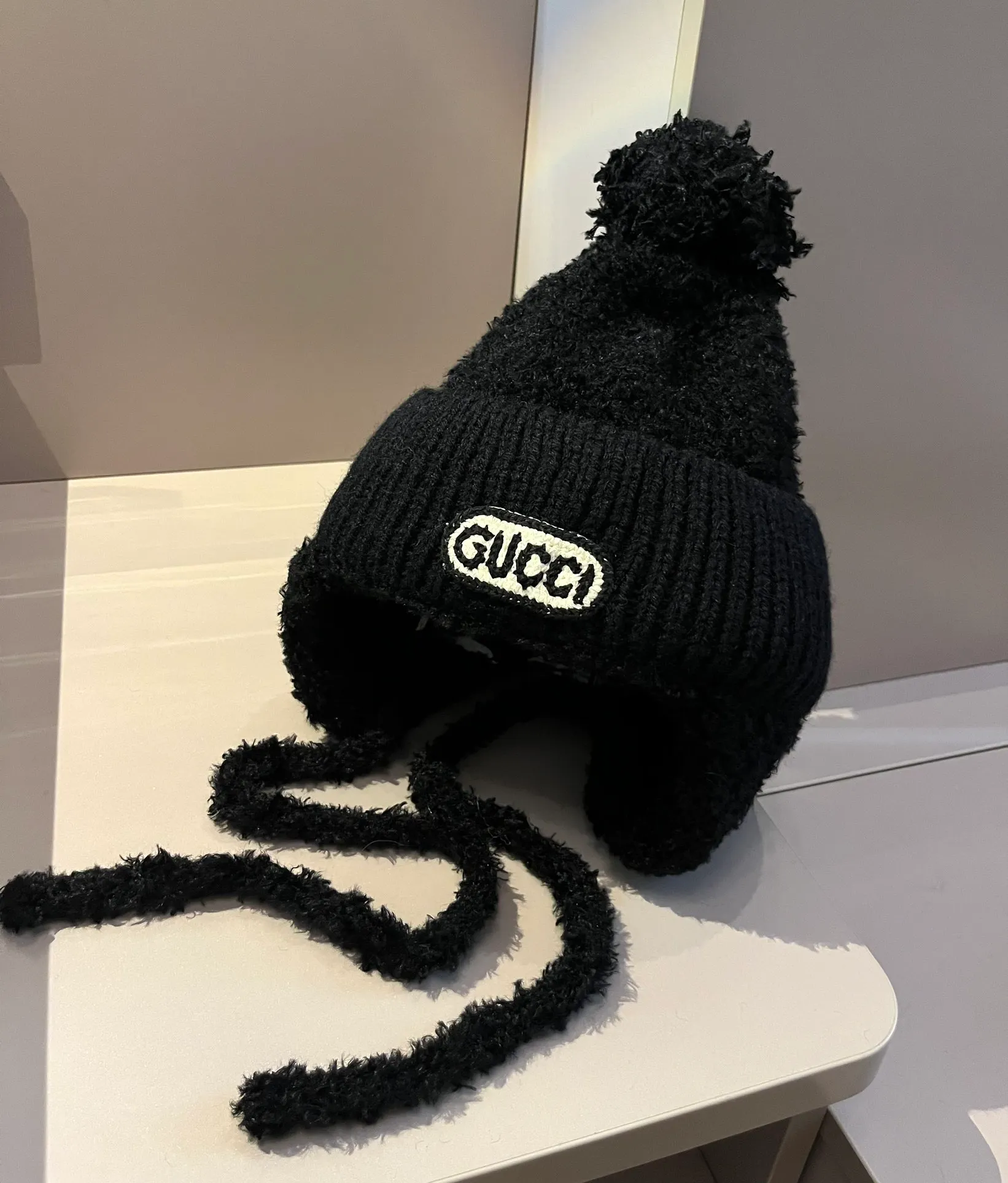 Gucci knitted ear protection beanie