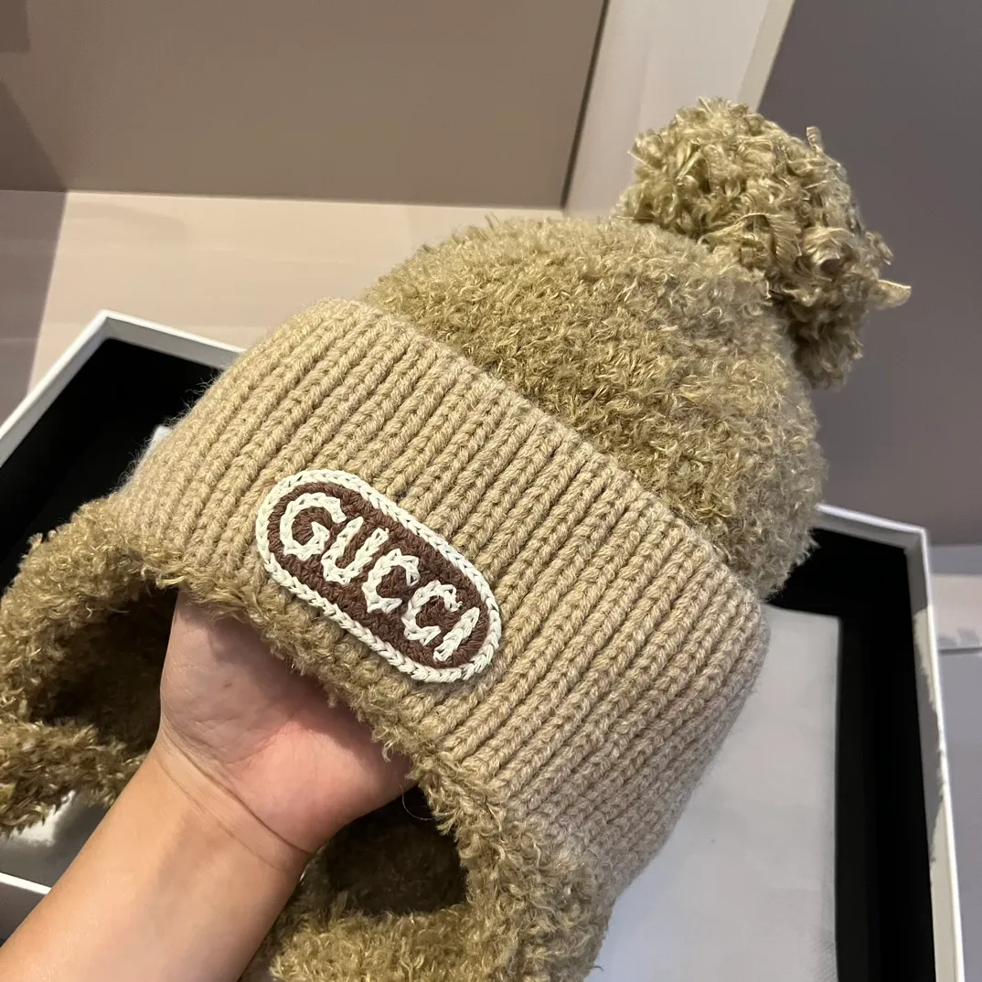 Gucci knitted ear protection beanie